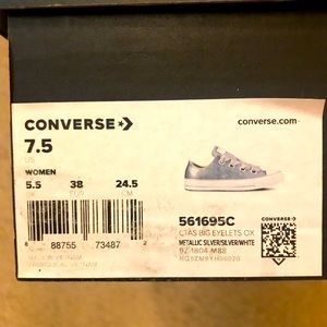 Chuck Taylor size 7.5 silver with ribbon laces